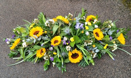 Sunflower coffin spray